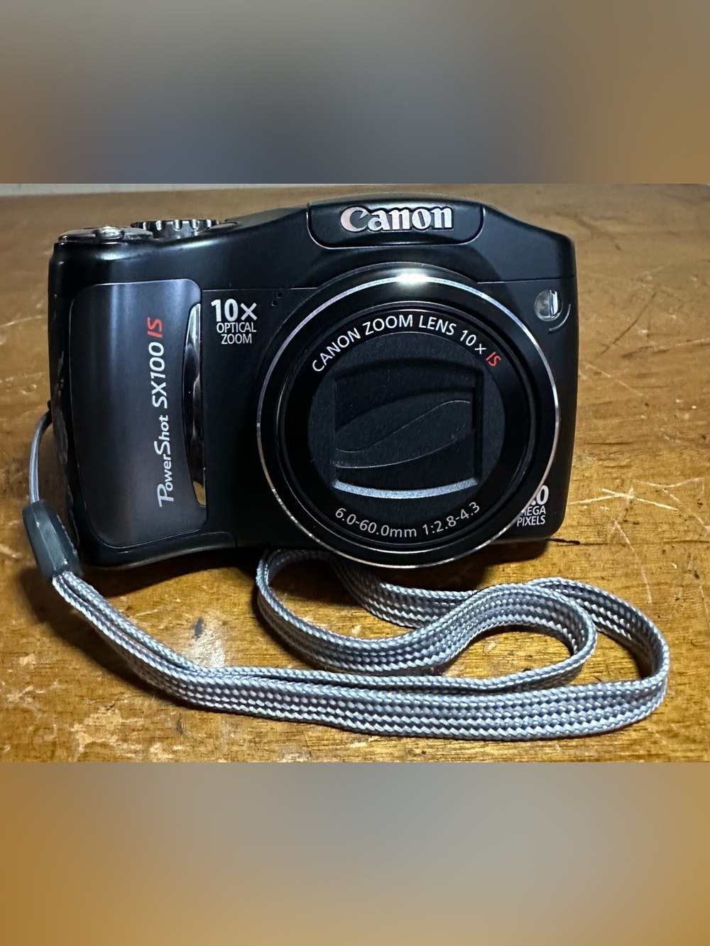 Canon PowerShot SX100IS 8MP Digital Camera w/10x Optical Image Stabilized Zoom